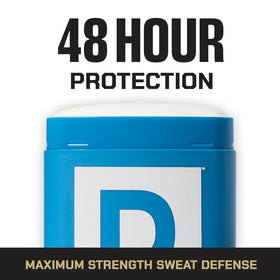 Duke Cannon cap off as user applies deodorant confidently