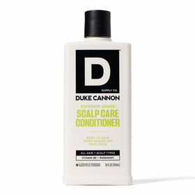 Duke Cannon front bottle view showing 14 oz size and bold label benefit