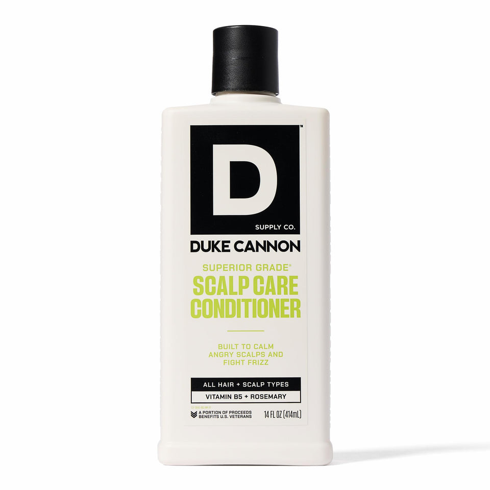 Duke Cannon front bottle view showing 14 oz size and bold label benefit