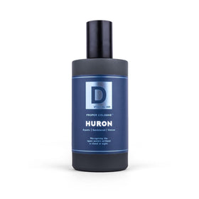 Duke Cannon spray mist mid-air illustrating easy, controlled application benefit
