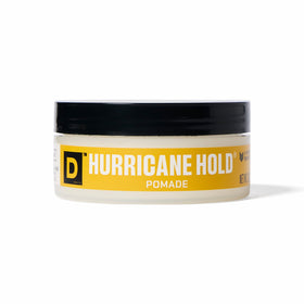 Duke Cannon front tin showing compact pomade packaging and strong hold