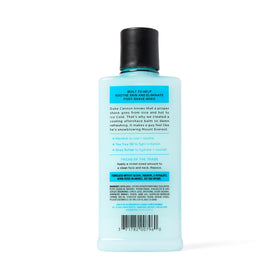 Duke Cannon balm staged with other grooming products to show routine pairing benefits