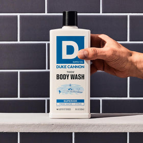 Duke Cannon lather on loofah showing effective cleansing foam
