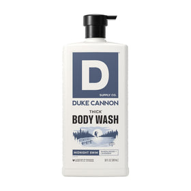 Duke Cannon bottle front view showing Midnight Swim label and size benefit