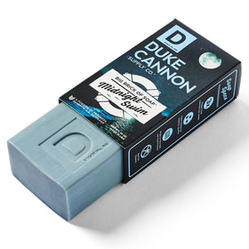 Duke Cannon single bar close-up highlighting firm triple-milled texture and durability