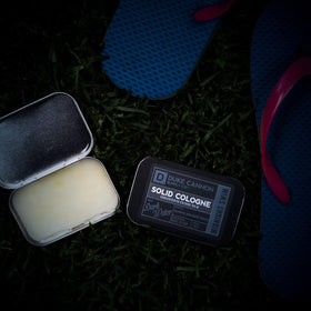 Duke Cannon tin in a pocket highlighting portable travel convenience
