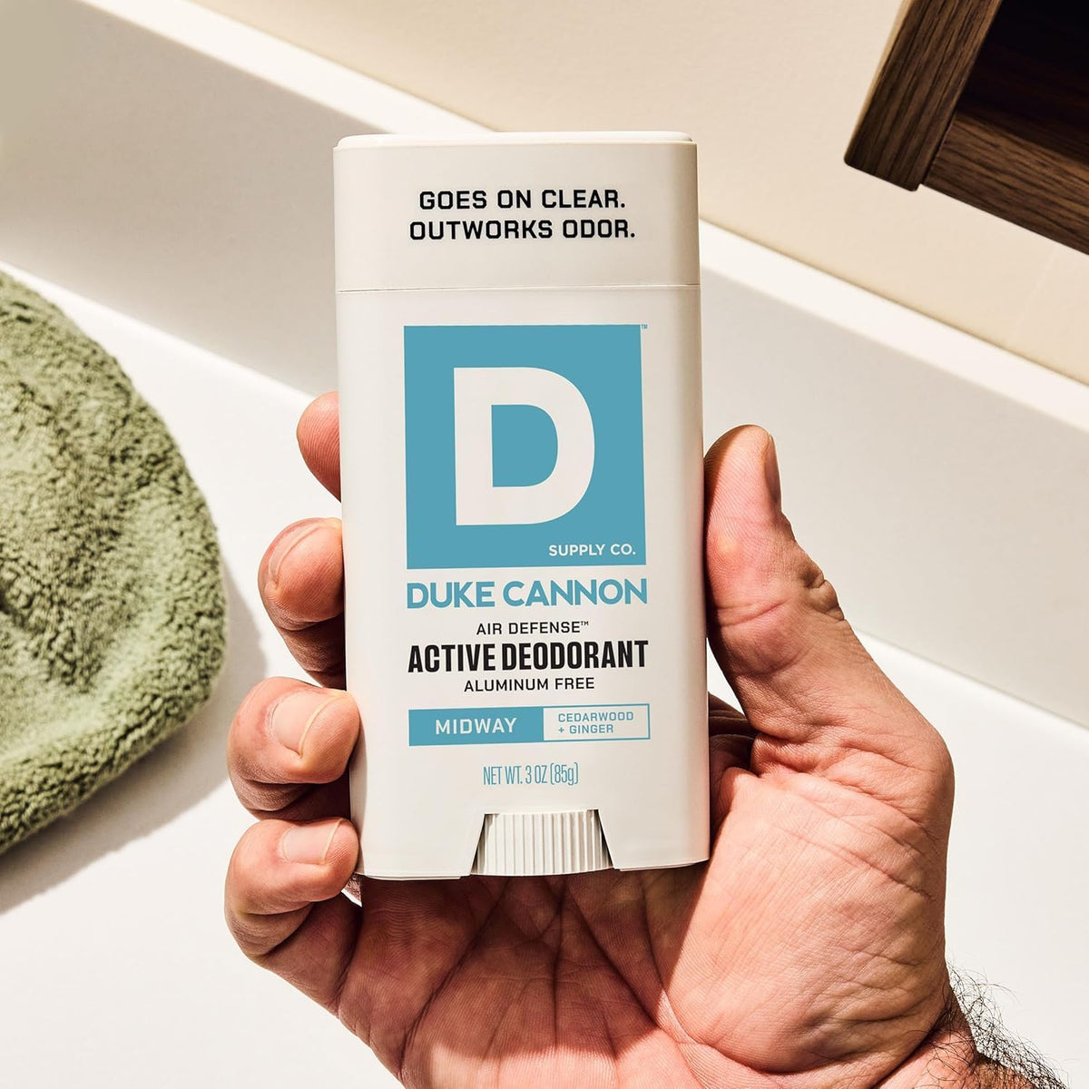 Duke Cannon on bathroom shelf in grooming routine suggesting cohesive scent layering