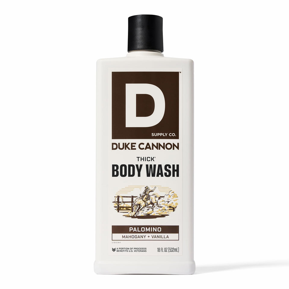 Duke Cannon front packaging showing bold Palomino label and 18 oz bottle benefit