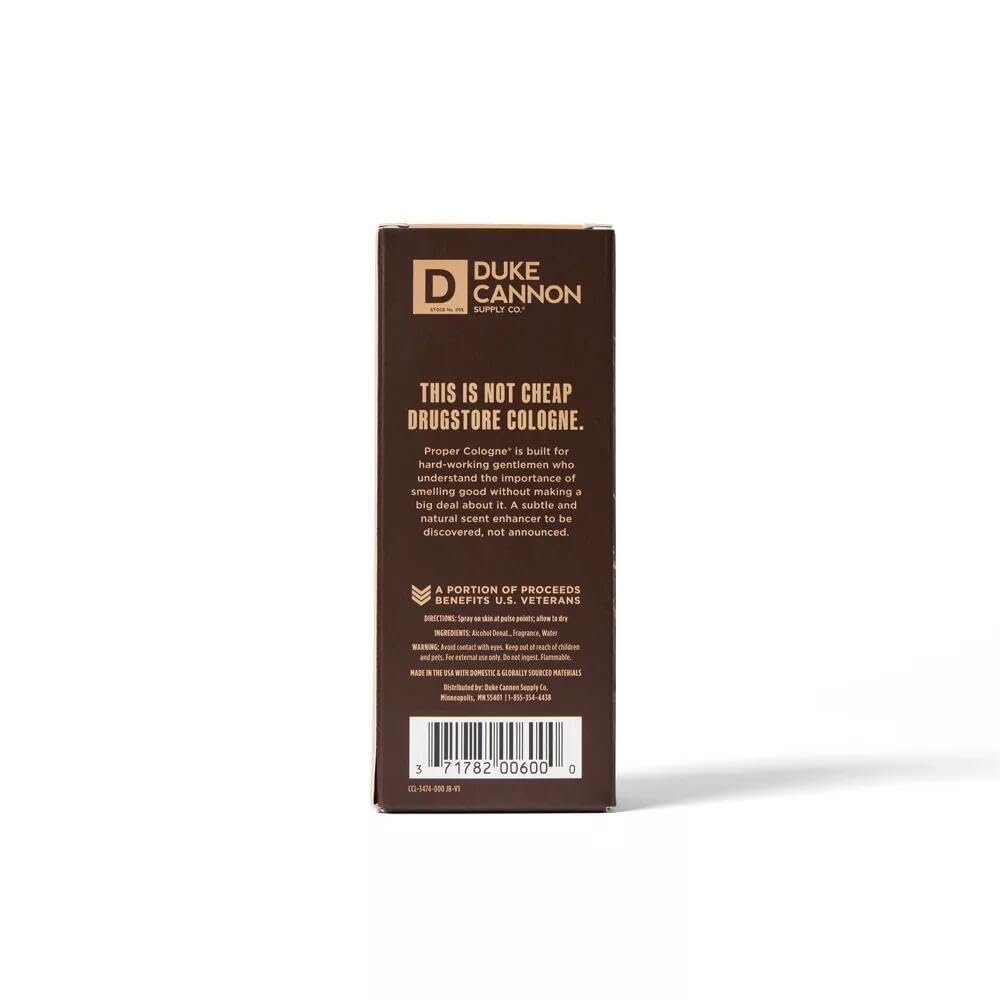 Duke Cannon Palomino beside a coin showing 1.7 fl oz scale for portability