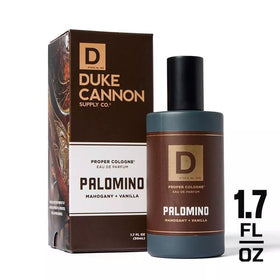 Duke Cannon Palomino on wooden surface evoking mahogany warmth and atmosphere