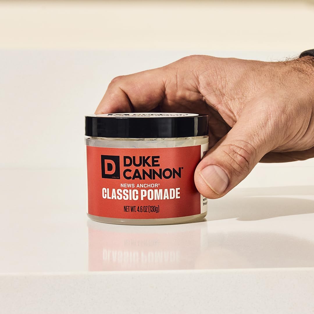 Duke Cannon open jar close-up of pomade texture highlighting easy application and matte finish