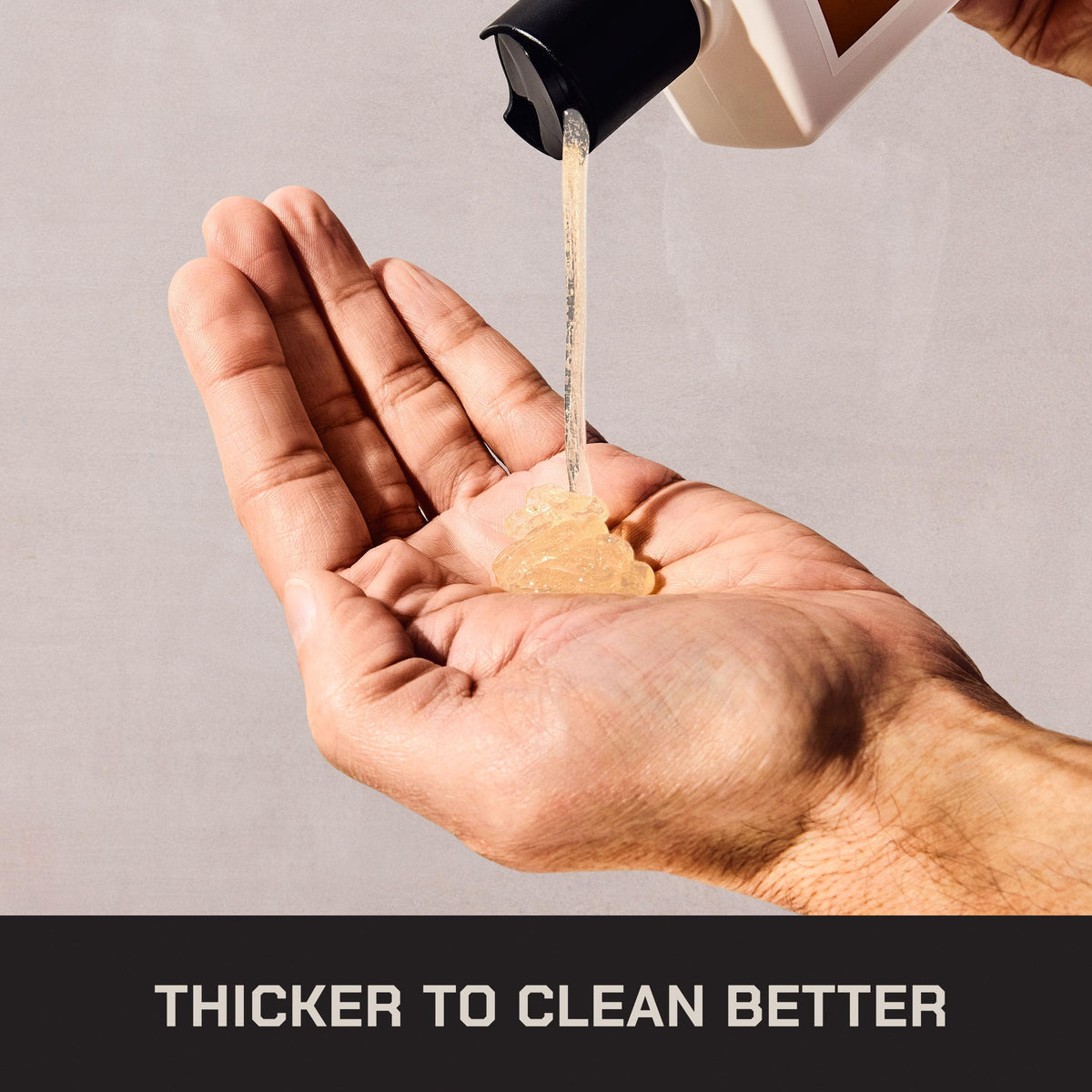 Duke Cannon pouring wash into hand demonstrating easy lather and efficient cleansing benefit
