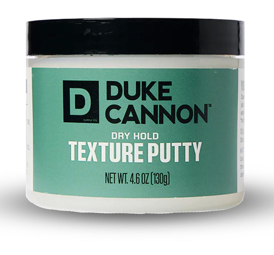 Duke Cannon putty front tin showing product and brand benefit of matte finish