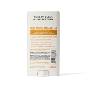 Product beside hiking gear showing Duke Cannon outdoorsy cedarwood scent