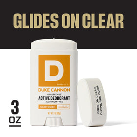Size comparison with coin illustrating Duke Cannon travel-friendly 3 oz