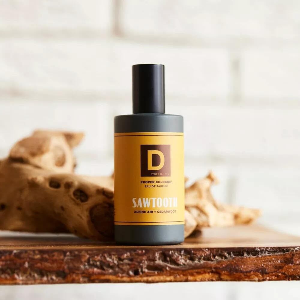 Duke Cannon sawtooth next to travel kit showing compact 1.7 fl oz portability