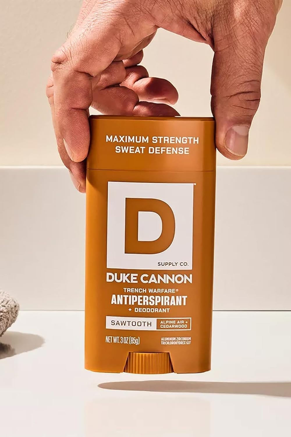 Duke Cannon visual of cedar and pine elements showing scent profile benefit