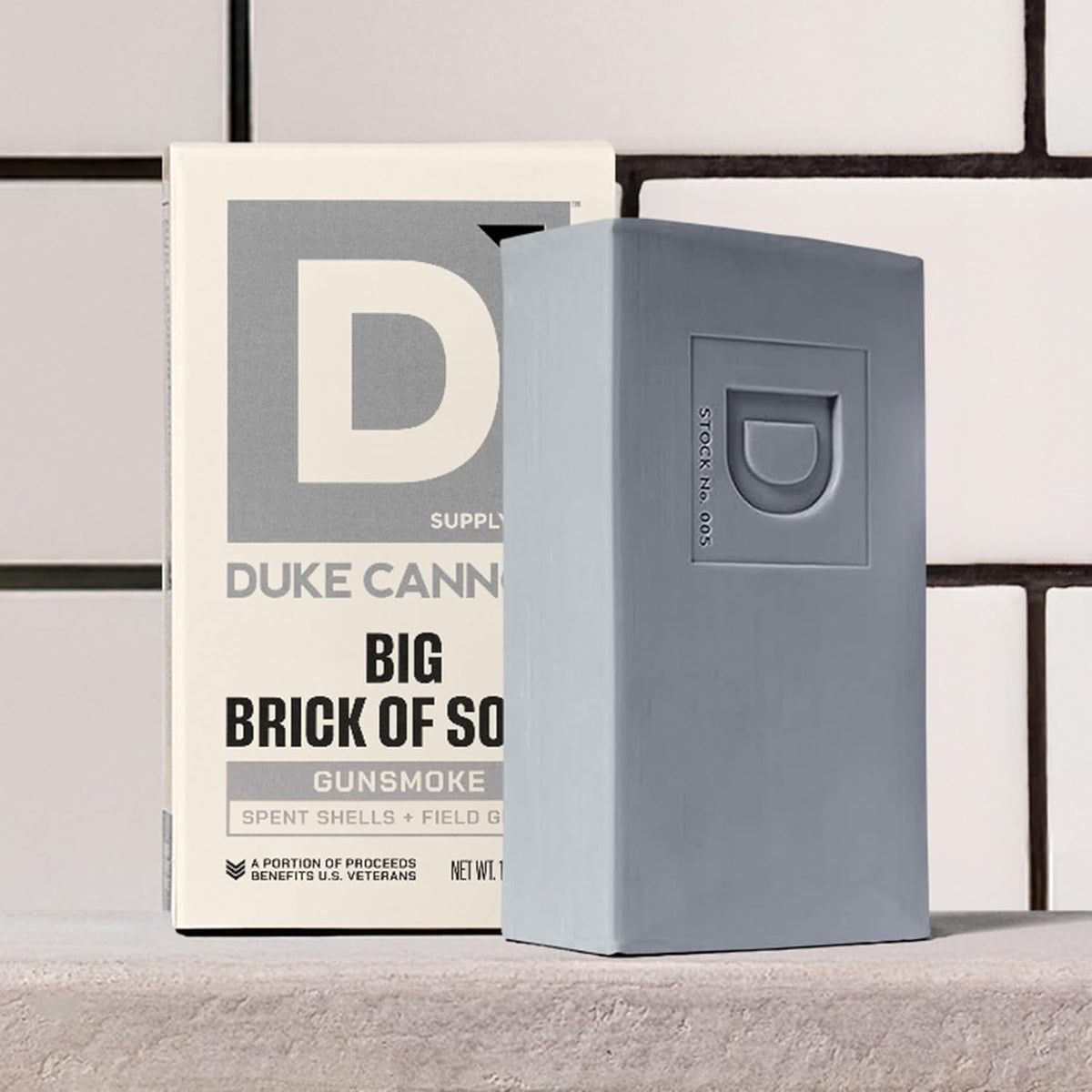 Duke Cannon on shower shelf showing storage recommendation and lasting bar benefit