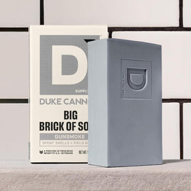 Duke Cannon on shower shelf showing storage recommendation and lasting bar benefit