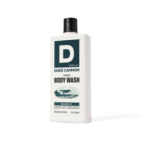 Duke Cannon 18 oz bottle beside common objects to show scale and value per bottle