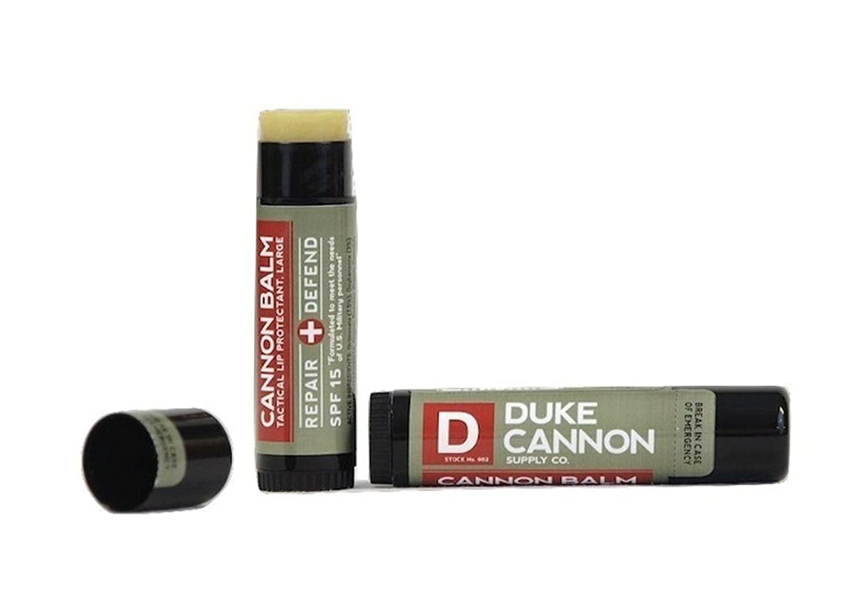 Duke Cannon tube next to common lip stick showing larger 0.56 oz size advantage