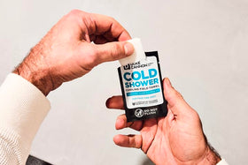 Duke Cannon wipe applied to forehead providing instant cooling comfort