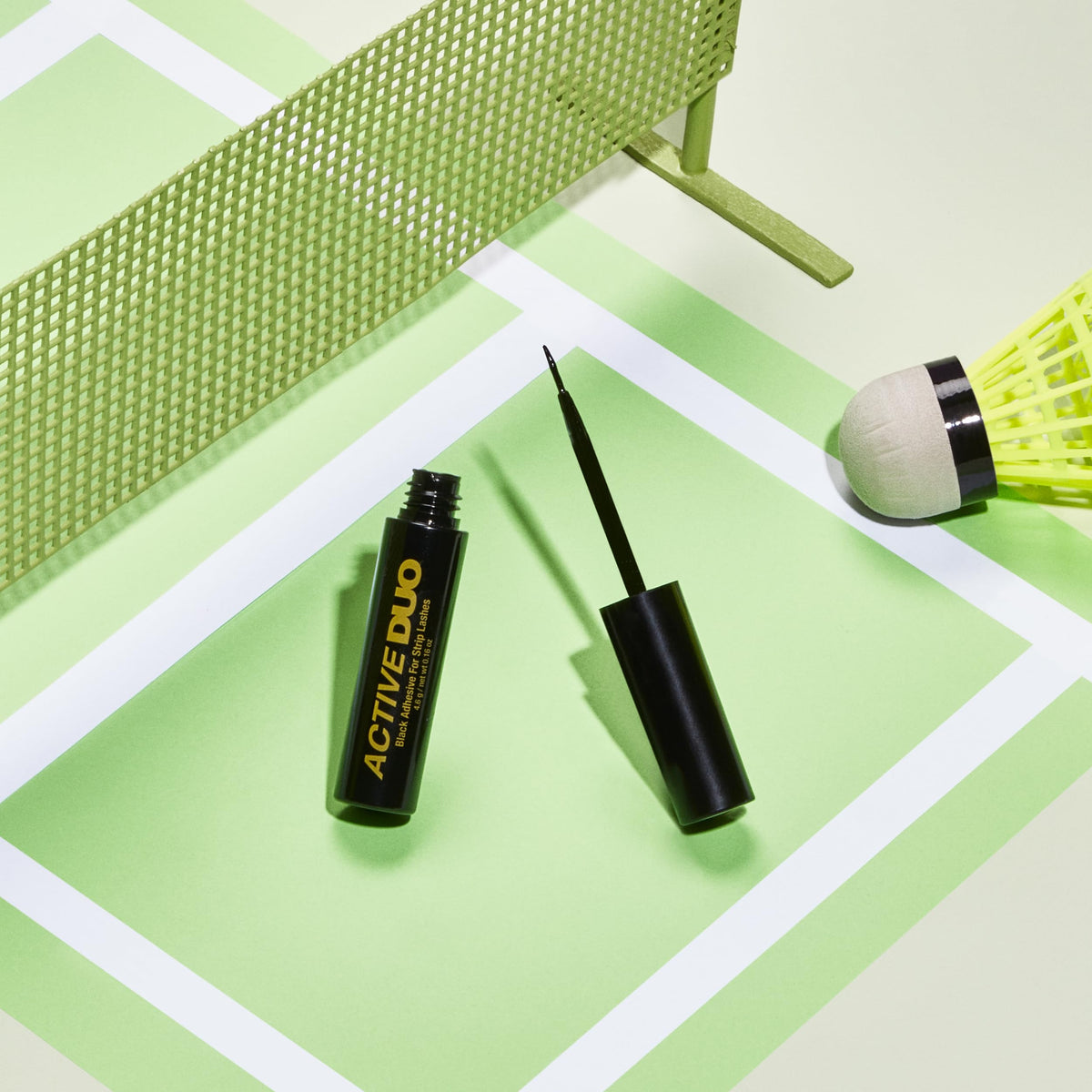 DUO close-up of glossy black adhesive texture for strong hold
