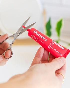 Duradry product label close-up, displays dermatologist-recommended formulation details