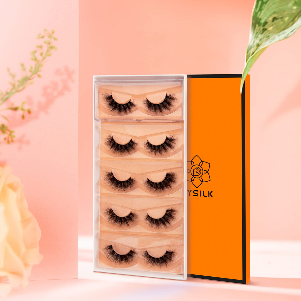 DYSILK lashes beside a ruler for scale, shows 16mm length and wearable size