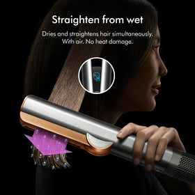 Dyson Airstrait ceramic pink finish close-up conveying premium color and style