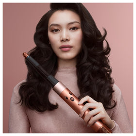 Dyson Airwrap i.d. smoothing brush detail highlighting bristles for frizz reduction