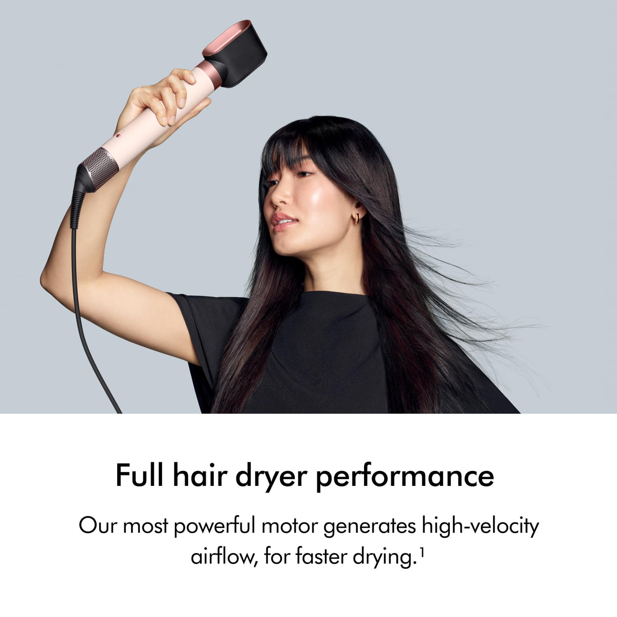 Dyson Airwrap styling in use on long hair producing bouncy waves and quick results