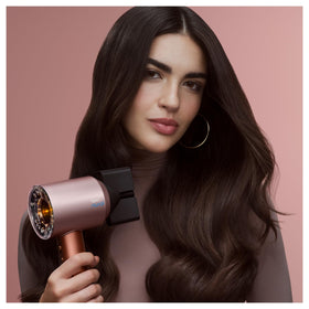 Dyson Supersonic Nural diffuser closeup showing air vents and even airflow for defined texture