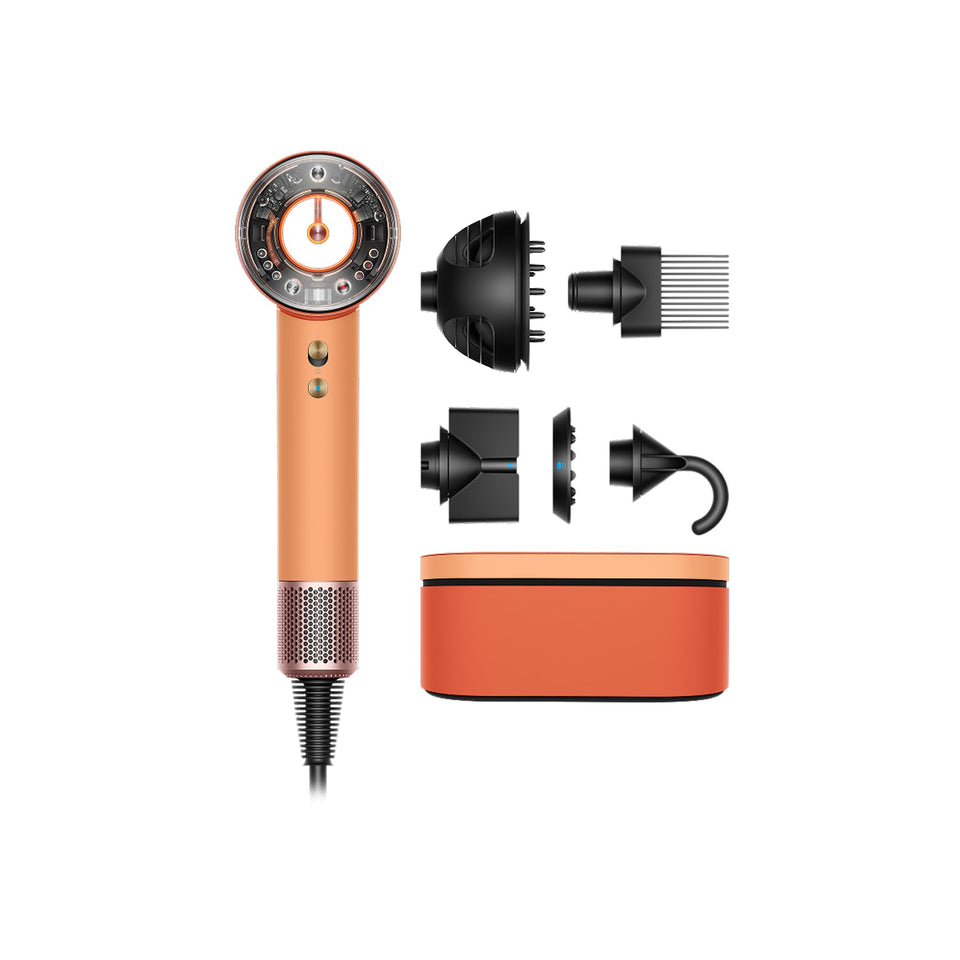 Dyson Supersonic front view showing Ceramic Apricot and Topaz finish and elegant design