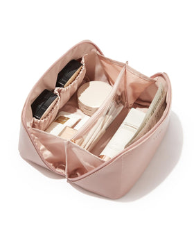 EACHY front view showing compact pink cosmetic bag and handle benefit: easy carrying