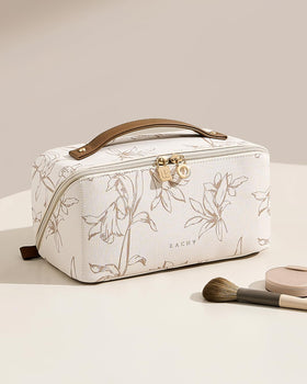 EACHY bag held in hand showing size and portable scale for travel ease
