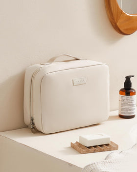 EACHY bag packed with full-size bottles showing generous capacity benefit
