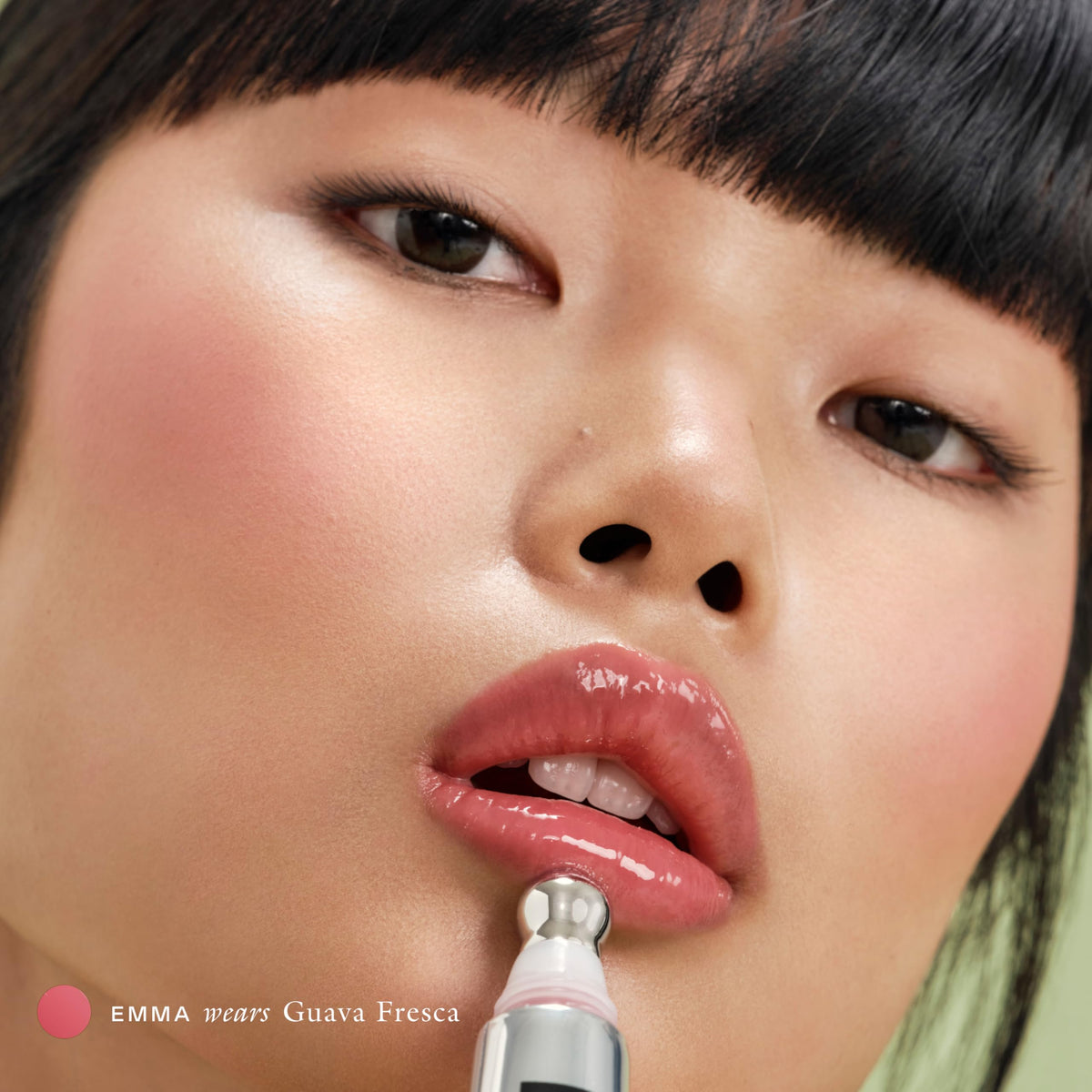 EADEM balm applied on lips demonstrating smoother, glossy effect