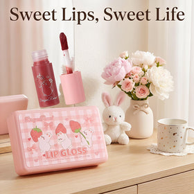 Eakroo lip gloss held in hand demonstrating compact travel size