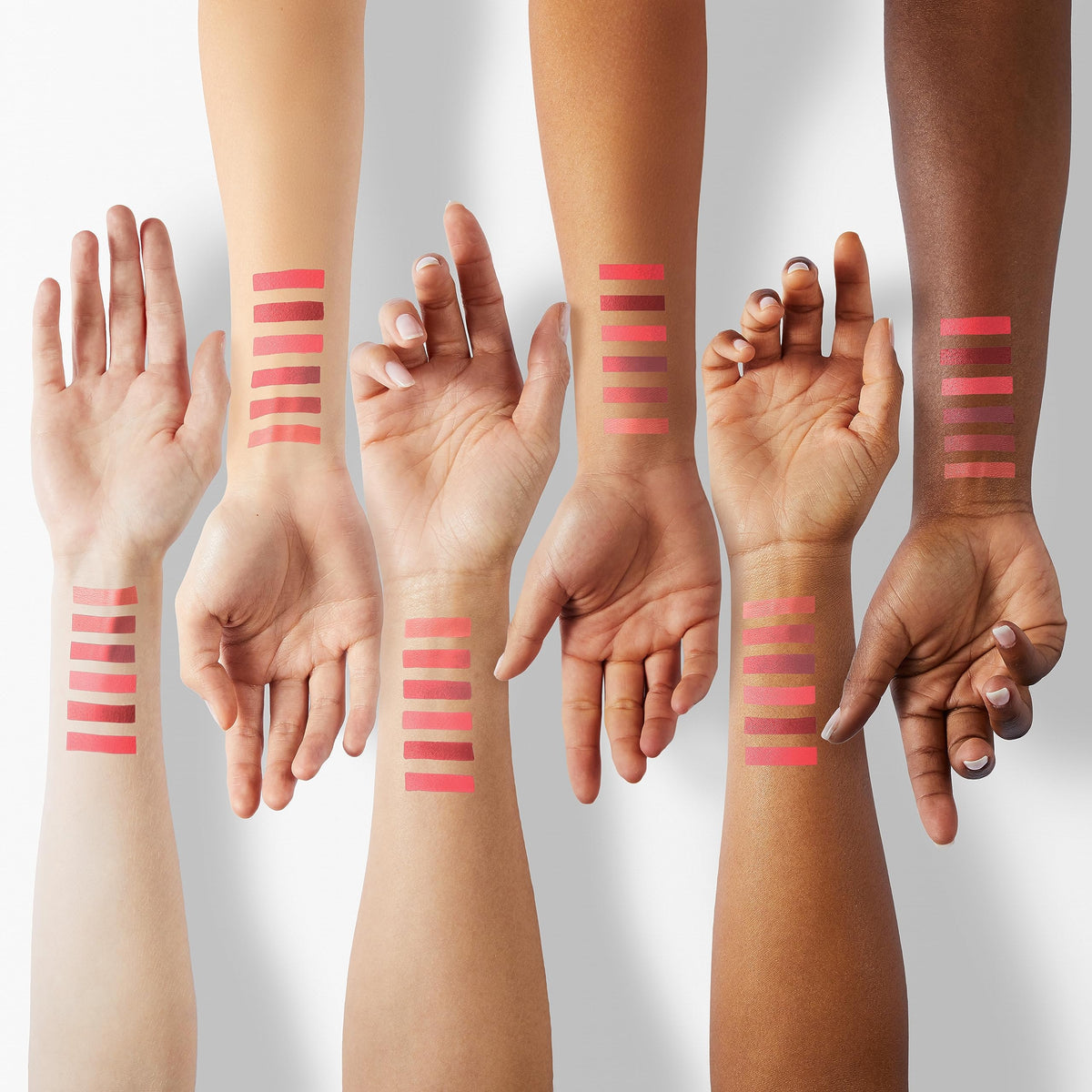 Eakroo swatches on forearm showing six shades for shade-selection benefit