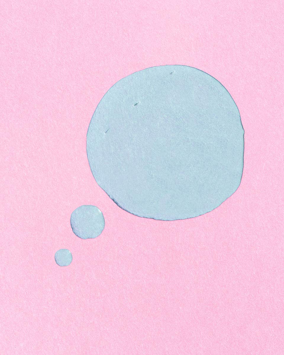 Close-up of the blue serum texture highlighting lightweight, non-greasy squalane finish and shine control