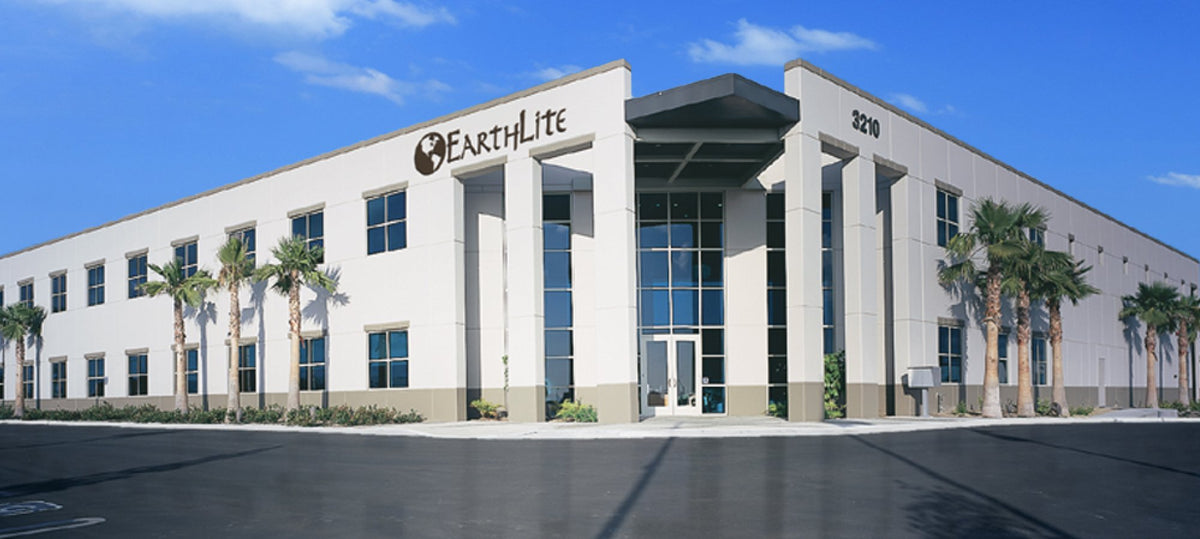 EARTHLITE spa lifestyle scene with warmer in use to enhance client relaxation and professional care