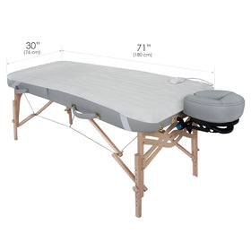 EARTHLITE warmer installed on a massage table demonstrating discreet placement under linens