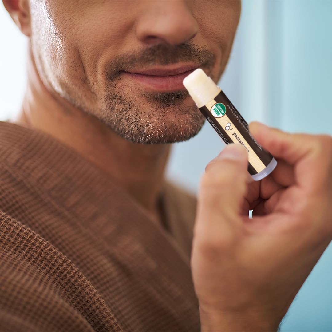 Earth's Daughter tube on nightstand showing bedtime moisturizing routine