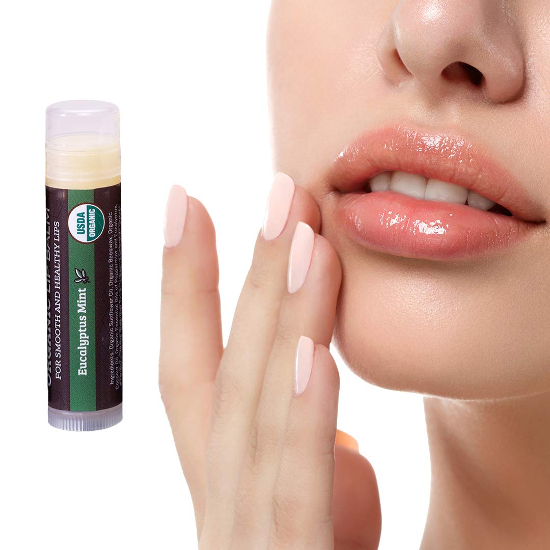 Earth's Daughter lip balm used outdoors in winter showing protective use