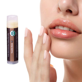 Earth's Daughter vanilla bean beside tube for scent context and pleasant flavor benefit