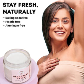 ECO ROOTS cream on fingertip being applied to skin for targeted odor control