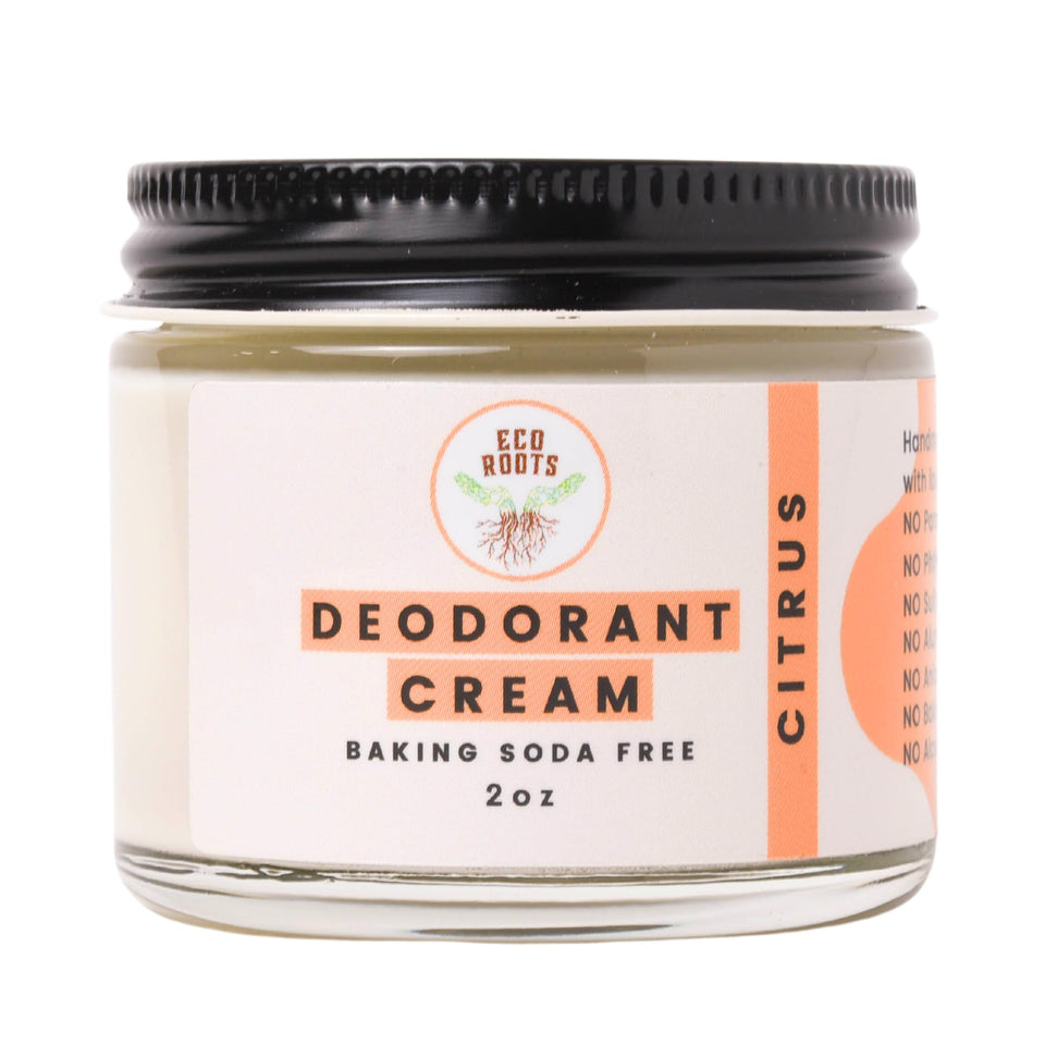 ECO ROOTS front jar with citrus label showing natural deodorant branding and clarity