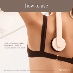 EcoTools applicator in use applying self-tanner to back for streak-free results