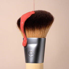 EcoTools brush cleaning with shampoo showing easy maintenance and bristle care